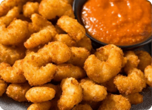 Crispy fried shrimp served with a spicy dipping sauce.
